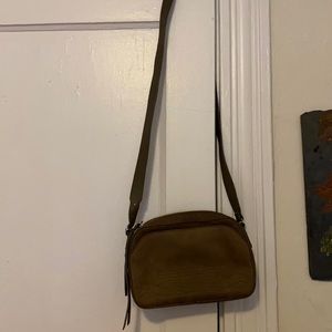 ORION CARLOTO’s SUEDE ALL-SAINTS BAG